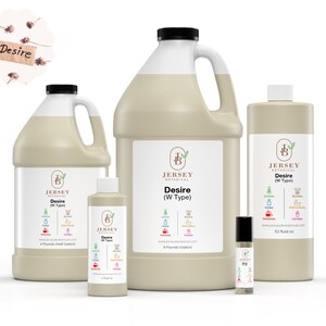 May include: Four bottles of "Desire" fragrance oil in various sizes, from a small roll-on bottle to a large gallon jug. The bottles are labeled with the brand name "Jersey Botanical" and the scent name "Desire (W Type)".