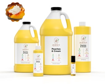May include: Four bottles of Peaches & Cream scented oil in various sizes, from a small roll-on bottle to a large 1-gallon jug. The bottles are yellow and feature a label with the Jersey Botanical logo and product name.