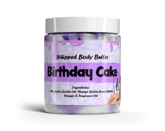 May include: A purple and white jar of whipped body butter with the text "Whipped Body Butter Birthday Cake" and a list of ingredients: Shea Butter, Jojoba Oil, Mango Butter, Cocoa Butter, Vitamin E, Fragrance Oil.