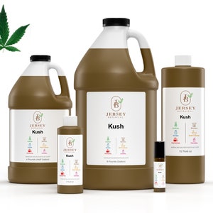 May include: Four brown bottles of Kush essential oil in different sizes, from a small roll-on bottle to a large 1-gallon jug. The bottles are labeled with the Jersey Botanical logo and the name "Kush".