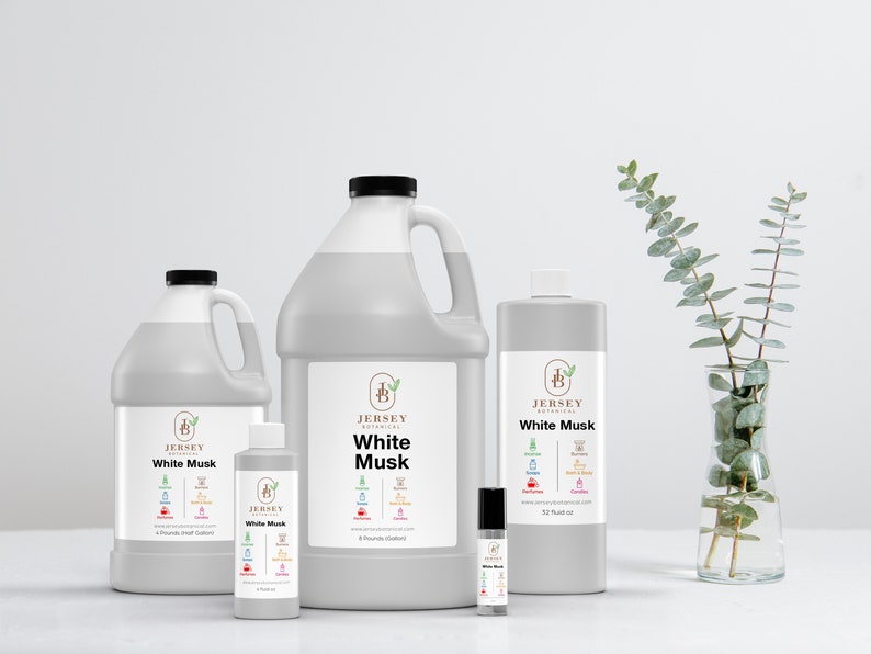 May include: Four bottles of White Musk fragrance oil in various sizes from Jersey Botanical. The bottles are white with black labels and the text "White Musk" is printed in black. The smallest bottle is a 1/2 oz roll-on, the next is a 2 oz bottle, the next is a 8 oz bottle, and the largest is a 32 oz bottle.