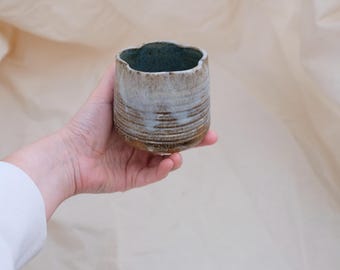 Handmade Stoneware Tea Cup: Rustic Ceramic Pottery with Flower Rim