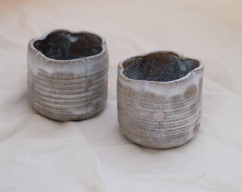Handmade Stoneware Tea Cup: Rustic Ceramic Coffee Mug with Flower Rim