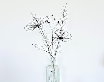 Ein minimalistisches Wildblumen Bouquet als zeitloses Stück botanischer Line Art