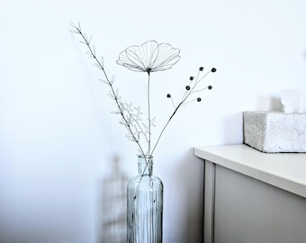 A Small Wire Bouquet with a Meadow Bloom as a Delicate Piece of Botanical Art