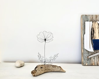 A Wire Flower Sculpture on Atlantic Driftwood as a Unique Piece of Coastal Beach House Art