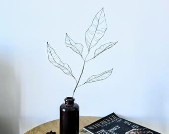 A Delicate Wire Leaf Branch as an Ethereal Piece of Minimalist Botanical Sculpture