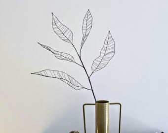 A Delicate Wire Leaf Branch as an Ethereal Piece of Minimalist Botanical Sculpture