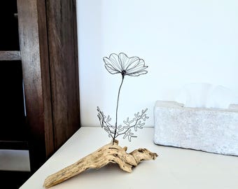 A Wire Flower Sculpture on Atlantic Driftwood as a Unique Piece of Coastal Beach House Art