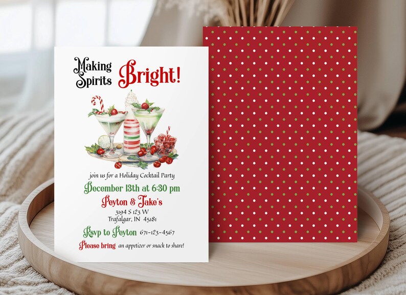 May include: A white holiday cocktail party invitation featuring the text Making Spirits Bright! and illustrations of two martini glasses with garnishes and a striped bottle. The back is red with white polka dots. Includes event details.