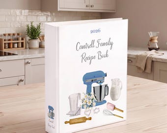 May include: A white three-ring binder titled 2026 Cantrell Family Recipe Book. The cover features watercolor illustrations of a blue stand mixer, a pitcher of milk, a rolling pin, a whisk, a spatula, cookie cutters, and a bouquet of white daisies.