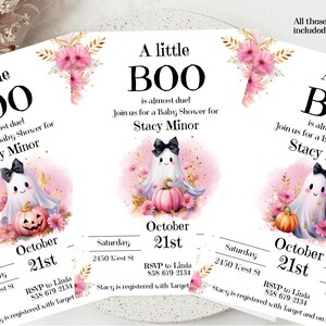 May include: Three pink and white baby shower invitations with a ghost and pumpkin illustration. The text on the invitations reads "A little BOO is almost due! Join us for a Baby Shower for Stacy Minor. Saturday, October 21st, 2450 West St. RSVP to Linda 858-679-2134. Stacy is registered with Target."