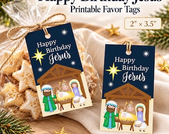 May include: Two rectangular favor tags measuring 2 inches by 3.5 inches, featuring a dark blue background with a nativity scene illustration, a yellow star, and the text Happy Birthday Jesus, attached to a clear bag of star-shaped cookies.