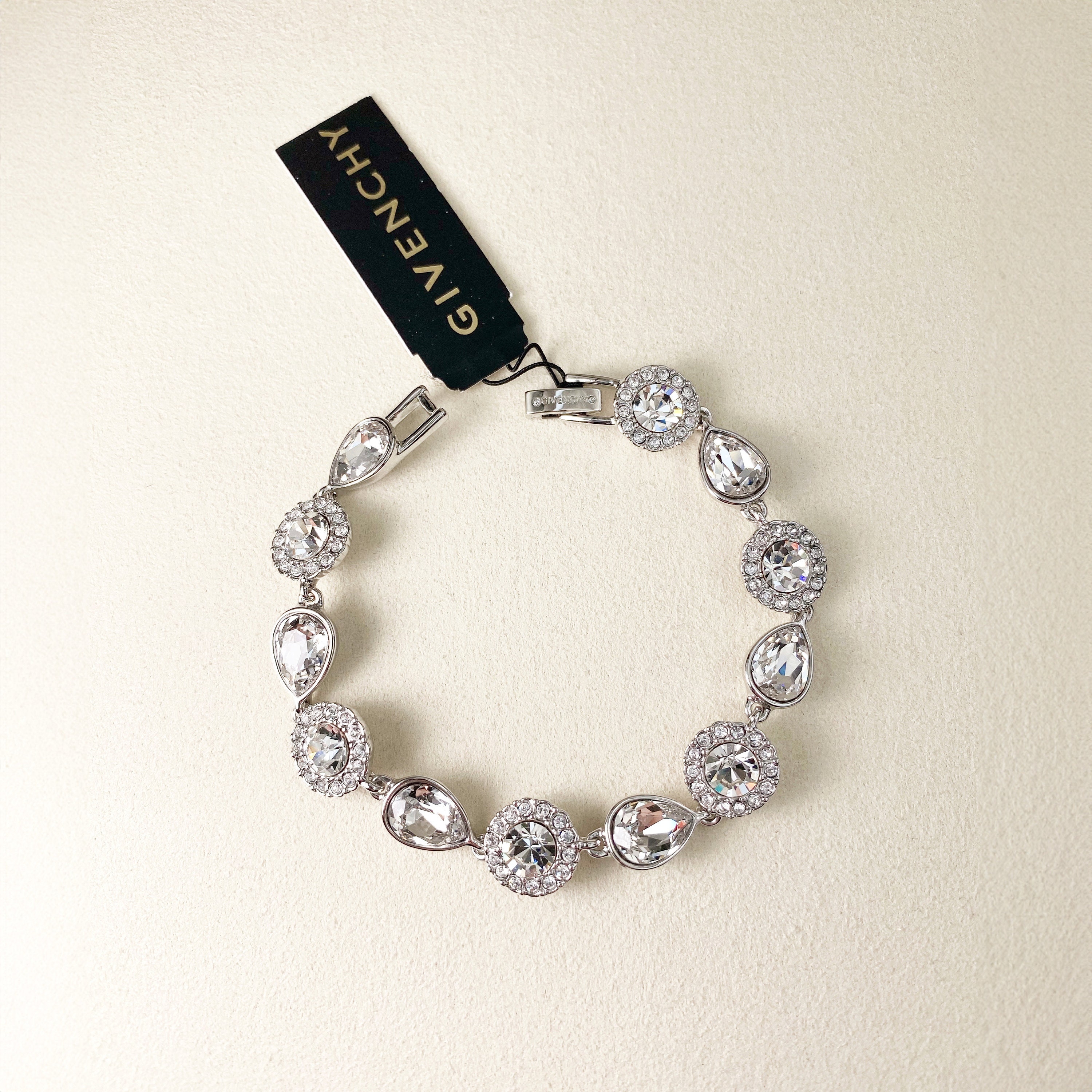 Givenchy Flower set Silver tone, adjustable bracelet, earrings.5