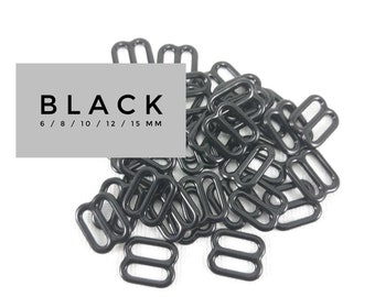 May include: A collection of black metal bra strap sliders and rings against a white backdrop. The text "BLACK" is displayed on a grey rectangle, with size options of 6, 8, 10, 12, and 15 mm.