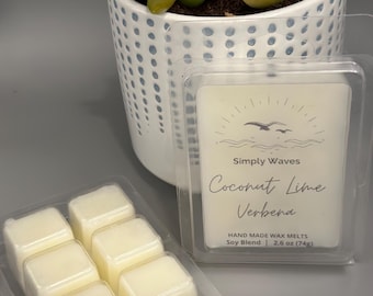 May include: A clear plastic container holds six square wax melts. Another container holds wax melts with the text "Simply Waves Coconut Lime Verbena" and "2.6 oz (74g)". A potted succulent plant is in the background.