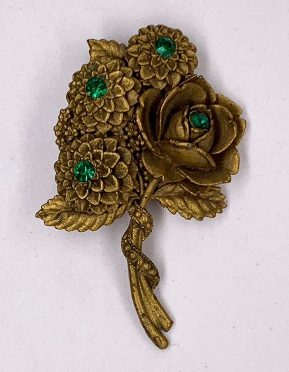 1940's Molded Flower Pin with Green Rhinestones - image 1