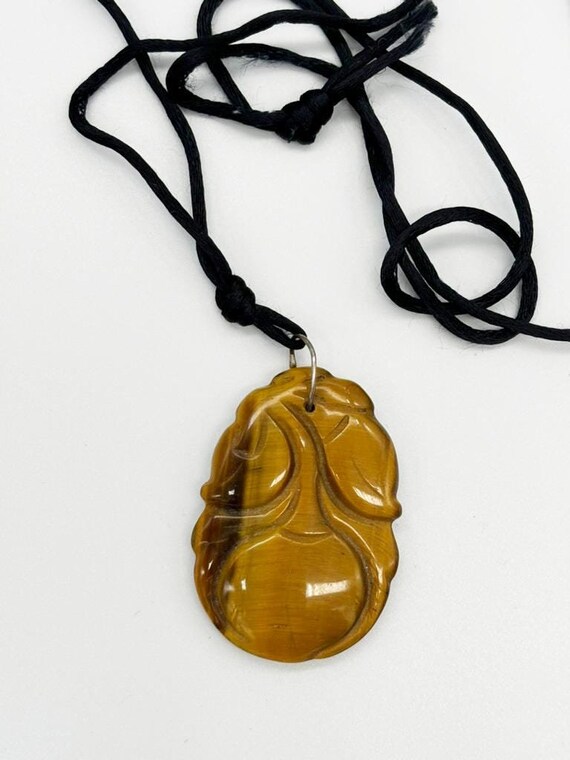 Carved Tiger's Eye Cherry Pendant