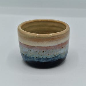 May include: A handmade wooden chopping board with a natural finish and a live edge. The board is rectangular, measuring approximately 45 cm long and 30 cm wide.