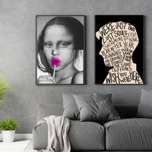 May include: Two black and white framed prints with a silhouette of a person's head and a woman with a pink lollipop. The text on the print reads "We were just two lost souls swimming in a fish bowl year after year running over the old ground & what we found? Have the same old fears. Wish you were here."