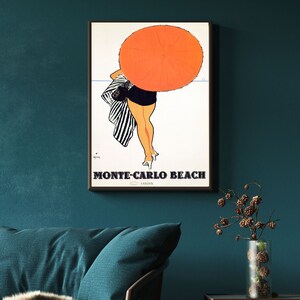 May include: A vintage poster advertising Monte-Carlo Beach. The poster features a woman in a black and white striped swimsuit walking away from the viewer, holding a large orange umbrella over her head. The text "Monte-Carlo Beach" is printed in black at the bottom of the poster.