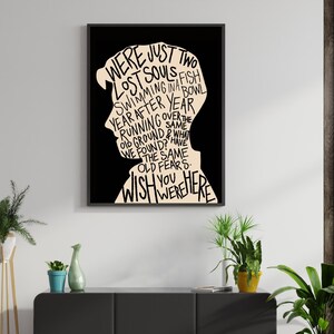 May include: Black and white typography art print with a silhouette of a person's head. The text reads "We were just two lost souls swimming in a fish bowl year after year running over the old ground & what we found? Have the same old fears. Wish you were here."