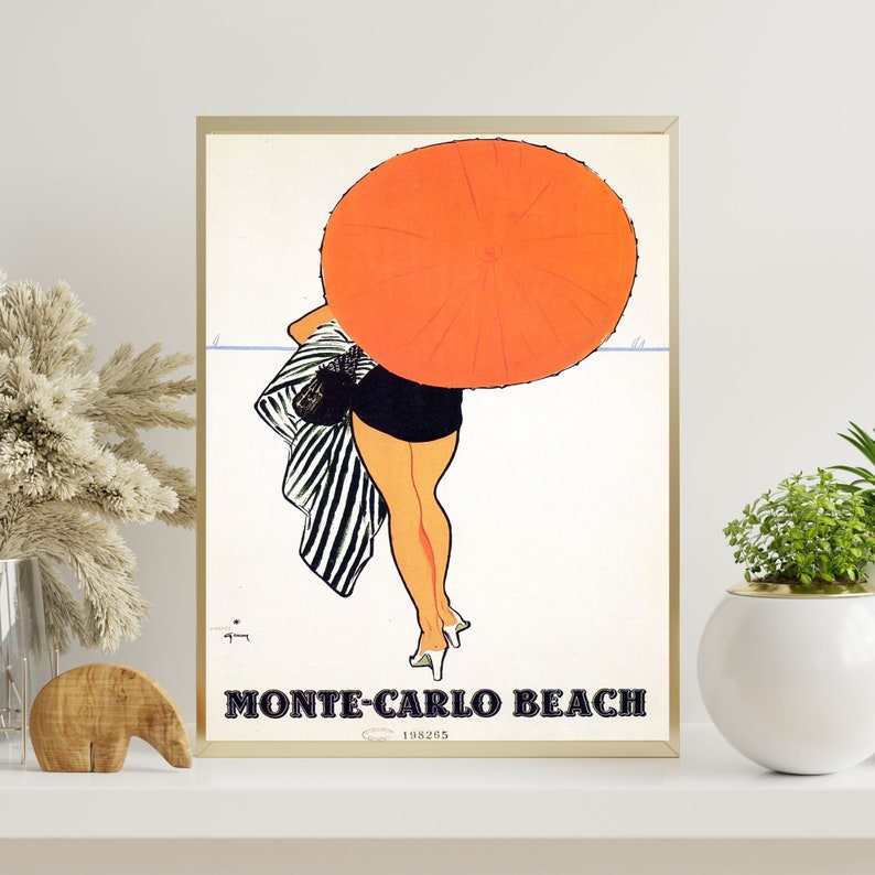 May include: A vintage travel poster featuring a woman in a black swimsuit and a striped sarong holding a large orange umbrella. The poster has the text "Monte-Carlo Beach" and the year "19295" printed on it.