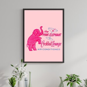 May include: A pink elephant illustration with a martini glass and the text "the PINK ELEPHANT Cocktail Lounge AIR CONDITIONED".