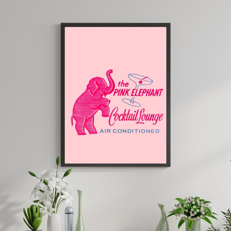 May include: A pink elephant illustration with a martini glass and the text "the PINK ELEPHANT Cocktail Lounge AIR CONDITIONED".