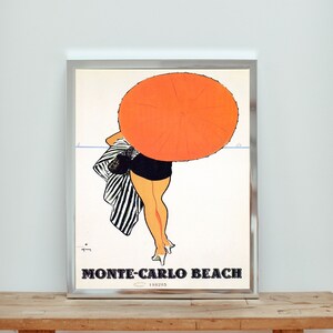 May include: A vintage poster advertising Monte-Carlo Beach. The poster features a woman in a black and white striped swimsuit holding a large orange umbrella.