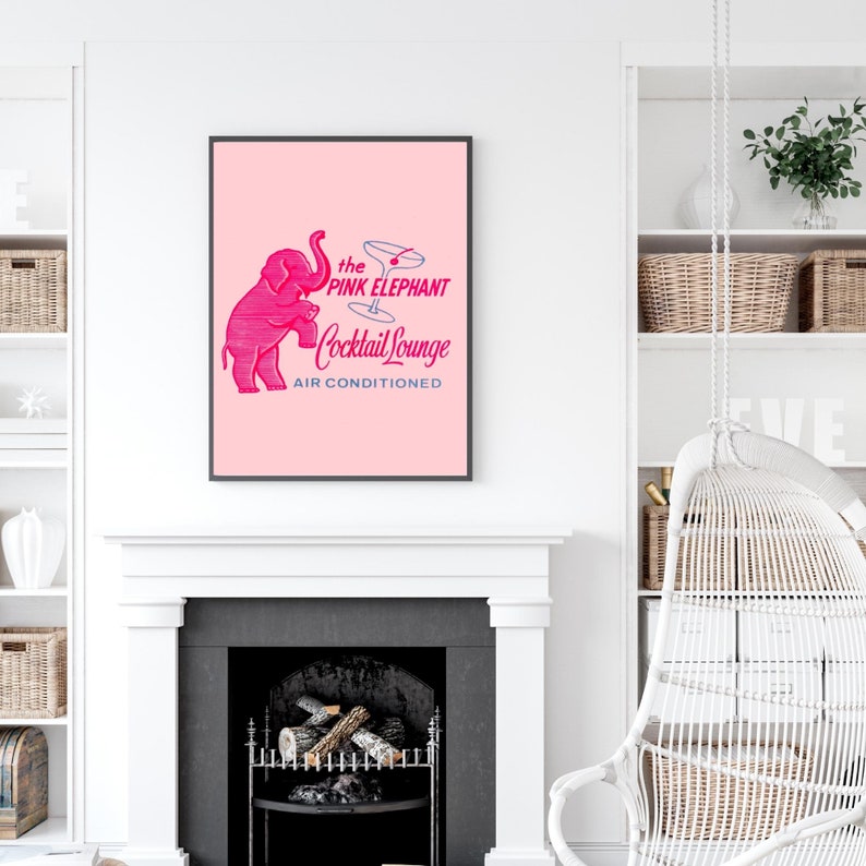 May include: Pink and white illustration of a pink elephant holding a martini glass with the text "the PINK ELEPHANT Cocktail Lounge AIR CONDITIONED".