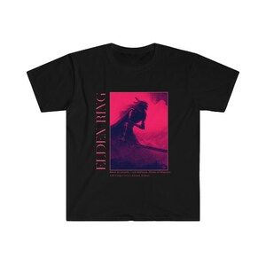 May include: Black t-shirt featuring a graphic design from the video game Elden Ring. The design includes a figure in a red and purple color scheme, with the game's title vertically on the left side. The shirt also has text at the bottom of the graphic.