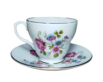 Flower cup and saucer from the English brand Royal Sutherland Bone China. Vintage England Porcelain.