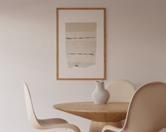 May include: A wooden dining table with a round top and a vase with a white ceramic vase. Four beige chairs surround the table. A framed abstract art print hangs on the wall behind the table.