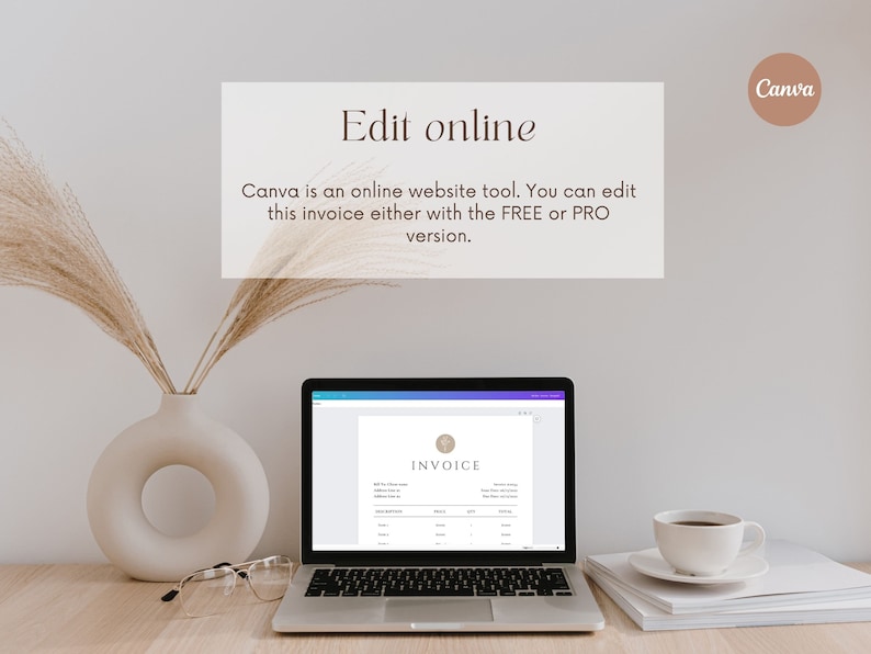 May include: A laptop computer displaying a Canva invoice template on the screen. The laptop is on a wooden table with a vase of dried pampas grass, a pair of glasses, and a stack of white paper. A cup of coffee is on the stack of paper. The text on the screen reads "INVOICE".