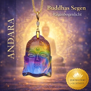 May include: A colorful pendant necklace featuring a Buddha head design. The pendant is a mix of rainbow colors and hangs from a gold chain. The image includes text that reads "Buddhas Segen Regenboenlicht" and "ANDARA".
