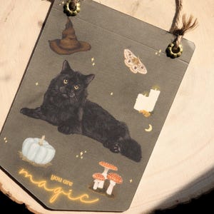 魔法の黒猫バナーグリーティングカード、職人による秋の魔女をテーマにしたデザイン、季節の願いを送るのに最適、ハロウィンギフトに最適