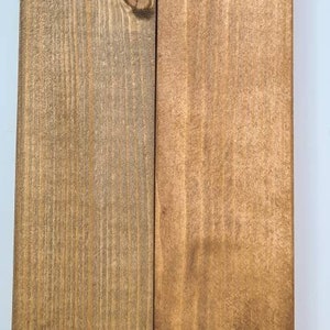 May include: Two wood samples, one stained in a Jacobean finish and the other in a Georgian finish. The wood is a light brown colour with a grain pattern.