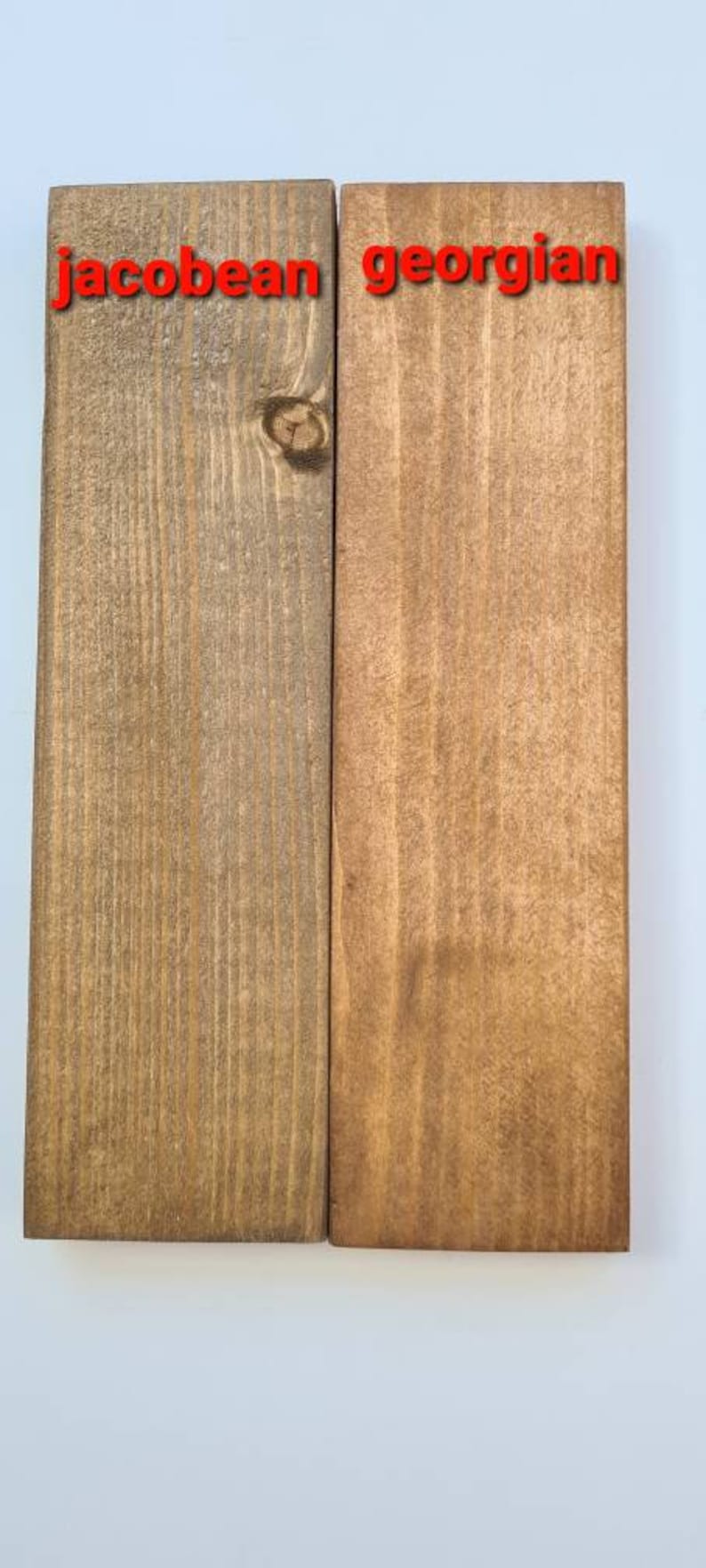 May include: Two wood samples, one stained in a Jacobean finish and the other in a Georgian finish. The wood is a light brown colour with a grain pattern.