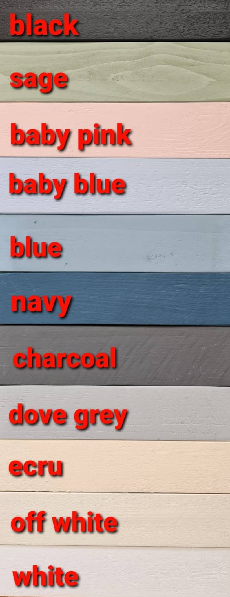 May include: A colour chart showing 11 different paint colours, from black to white. The colours are: black, sage, baby pink, baby blue, blue, navy, charcoal, dove grey, ecru, off white, and white.