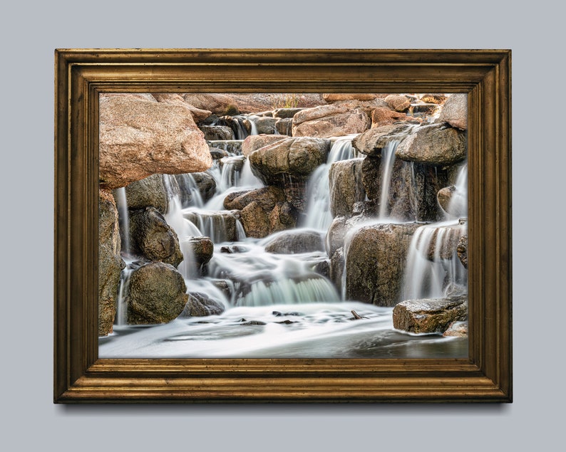 Waterfall Print wall art instant download of a soft waterfall gently flowing over the rocks in a mockup of the image beautifully framed.