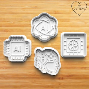 Könnte beinhalten: Vier weiße Ausstecher aus Kunststoff mit KI-Motiven. Designs umfassen eine Leiterplatte, ein Gehirn, ein Atom und einen Prozessor. Die Ausstecher befinden sich auf einer Holzoberfläche. In der oberen rechten Ecke befindet sich ein Herz mit dem Text "MY CUTTERS".