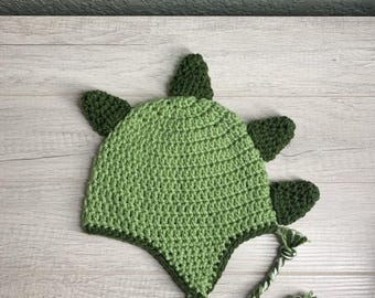 Handmade Crochet Dinosaur Hat – Whimsical Dino Beanie with Stand-Up Spikes, Braided Ties and Cozy Fit – Fun Gift for Kids, Teens & Adults