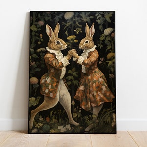 May include: Two rabbits dressed in vintage clothing are dancing in a garden setting. The rabbit on the left is wearing a brown and orange patterned jacket and the rabbit on the right is wearing a brown and orange patterned dress. Both rabbits have brown fur and long ears.