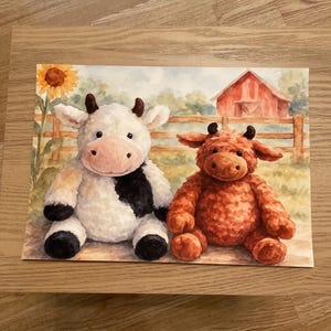 May include: Watercolor illustration of two plush cow toys. One is white with black spots, the other is orange. They sit in front of a fence, a red barn, and a sunflower. The style is soft and whimsical.
