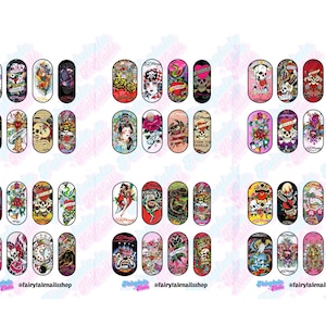 May include: A collection of nail art decals featuring various tattoo-inspired designs. The decals showcase skulls, roses, geishas, and other classic tattoo motifs in vibrant colors. The brand name "Ed Hardy" is visible on some decals.