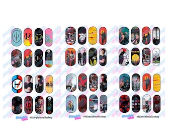 May include: A collection of nail art decals featuring various Twenty One Pilots themed designs, including band logos, album artwork, and portraits of the band members. The stickers are arranged in a grid on a white background with the text fairytalenails.