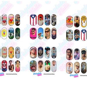 May include: A collection of nail art designs featuring various images. The designs include portraits, flags, and graphic elements. The nail art is displayed on a white background, with the words "Fairytale Nails" and "#fairytalenailshop" visible.