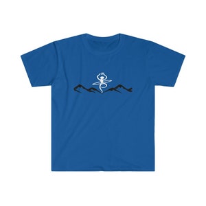 May include: Royal blue t-shirt featuring a white graphic of a dancer with arms outstretched, atop a line of black mountain silhouettes. The dancer is holding a crown. The shirt is made of a soft material.