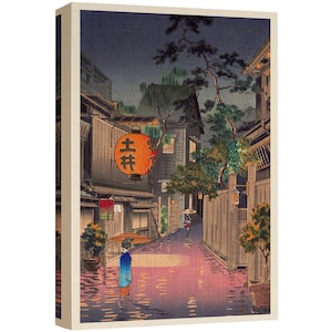 May include: A Japanese woodblock print depicting a rainy street scene in a traditional Japanese town. The street is lined with wooden buildings and lanterns. A woman in a blue kimono walks down the street, carrying an umbrella. The print is in shades of blue, green, and brown.